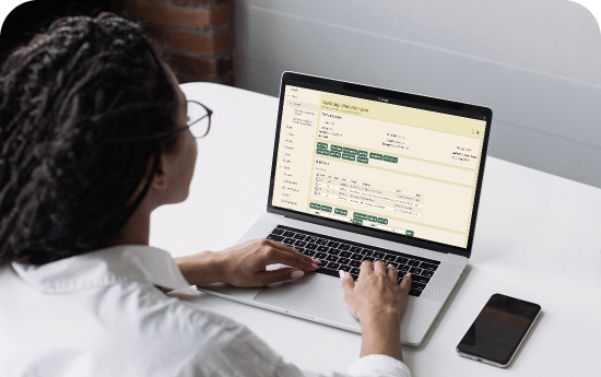 Woman using chartcaddy on laptop
