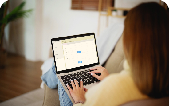Woman working in chartcaddy on laptop